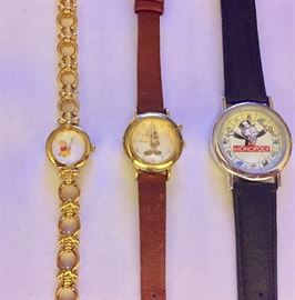 Pooh, Mickey, and Monopoly watches; Mickey watch plays Mickey Mouse Club theme song