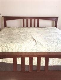 Mission-style king-size bed (mattresses are NOT for sale); matching armoire, bureau, and dresser/mirror are also offered