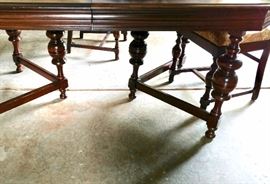 Base of antique table with hidden leaf
