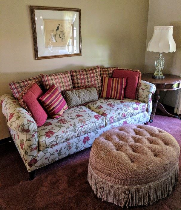 Walter E. Smith Floral Upholstery Sofa and Pillows, Red Ottoman on Wheels, Side Table, and Crystal Lamp