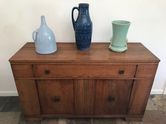Bauhaus  pecan wood side board, McDade green pottery vase, old blue crock water jug