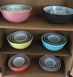 large collection of pyrex bowls all colors