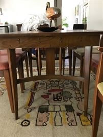 mid century dining table, large rug