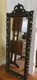 large and heavy ornate wood mirror