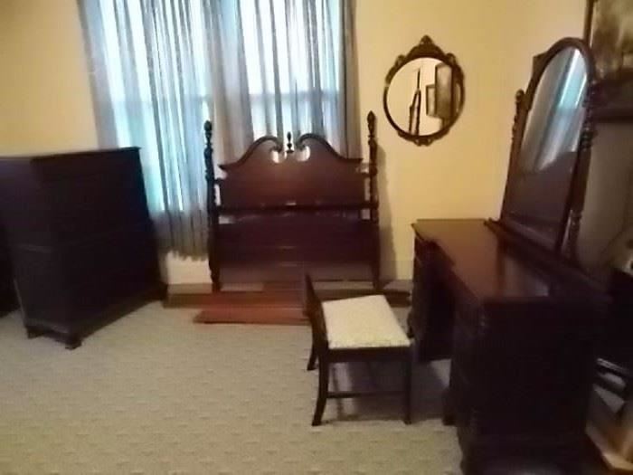 Pineapple Bedroom Suite full bed with side rails, dresser with mirror and vanity chair and 6 drawer chest.  Will not break suite!