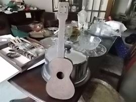 Very old - has metal body with a wooden neck