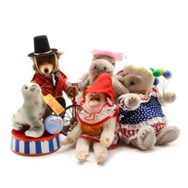 Steiff Circus Performers Lot of Five Golden Age of the Circus Animals: A complete set of the Steiff Circus Performers animals from the Golden Age of the Circus collection. Each German-made mohair animal features a button to their ear with tags and their original hexagon-shaped boxes. This lot includes the chimp on a unicycle, baby elephant balloon seller, hippo fat lady, seal with a ball and stand, and the ringmaster teddy.