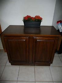 BUFFET CABINET WITH PULL UP SIDES