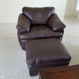 Overstuffed chair and ottoman close up