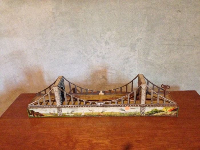 Antique tin toy of the George Washington Bridge