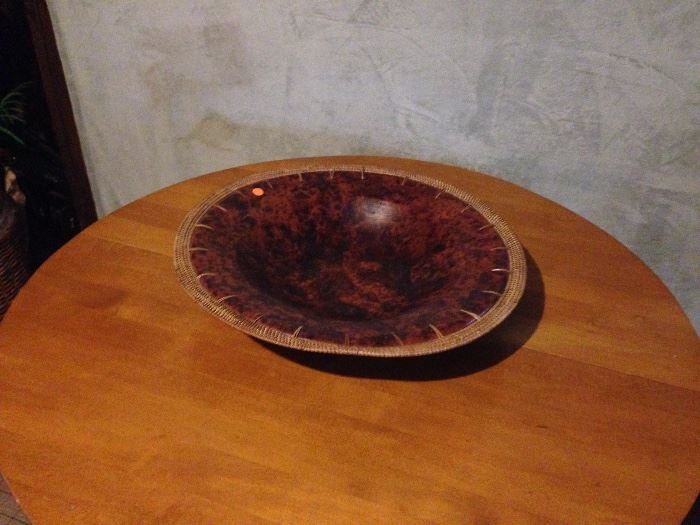 large decorative ceramic and wicker bowl