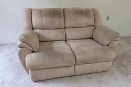 Dual reclining micro fiber loveseat.