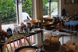 Vintage glass sets, teapot collection, wooden salad bowls.