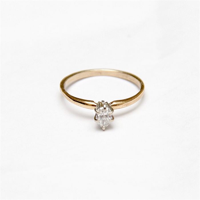 14K Yellow Gold Pear Cut Diamond Ring: A 14K pear cut diamond ring in a six prong setting.