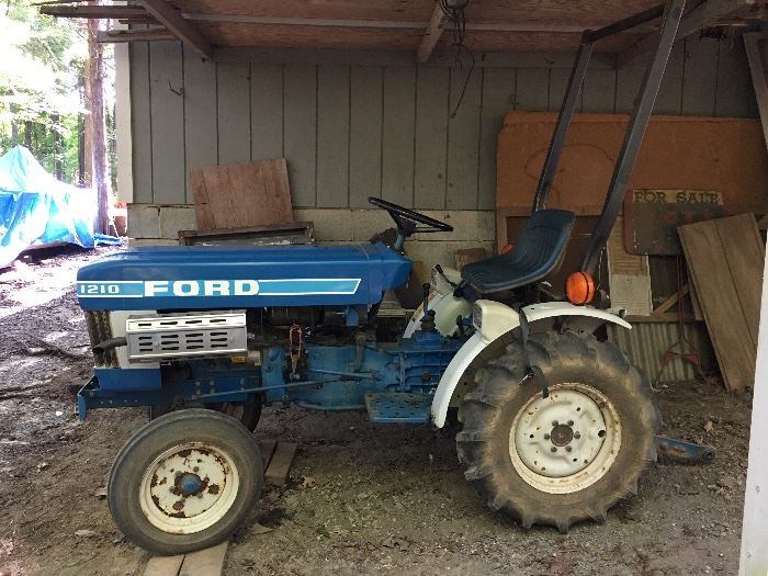 1988 Ford 1210 tractor with 6 attachments. Works well! 600 hours of use. 