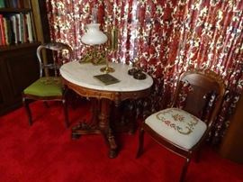 Victorian marble top table and side chairs.