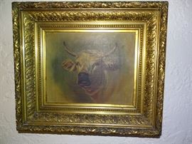 Oil painting of bull in ornate antique frame.