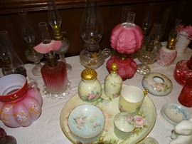 Collection of miniature oil lamps.