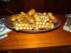 Antique trencher with wooden fruit.