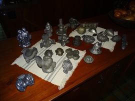 Collection of pewter chocolate molds.