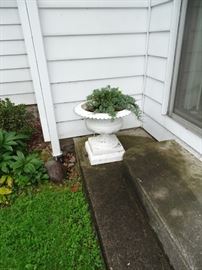 One of several cast iron urns.