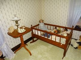 Antique cradle & candle stand.