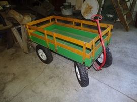 Large wagon with wood sides.