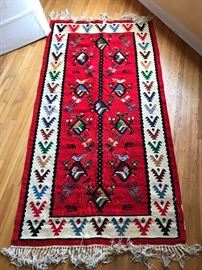 We have a couple of colorful rugs like this one
