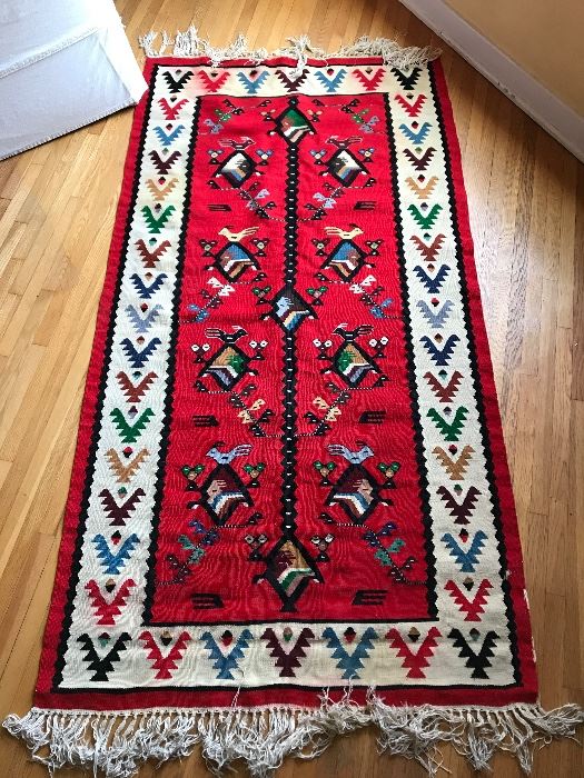 We have a couple of colorful rugs like this one