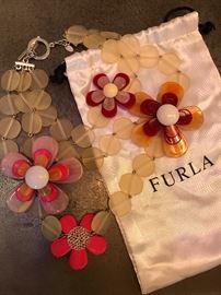 Just in time for summer, this fabulous flower necklace by Furla!