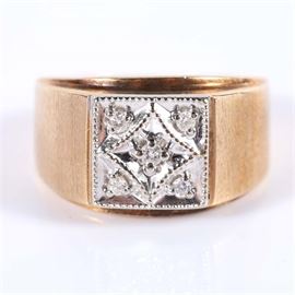 Vintage 10K Gold Diamond Ring: A 10K gold diamond ring.