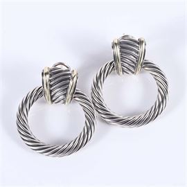Sterling Silver David Yurman Doorknocker Earrings: A pair of sterling silver David Yurman doorknocker cable hoop earrings with 14K yellow gold posts.