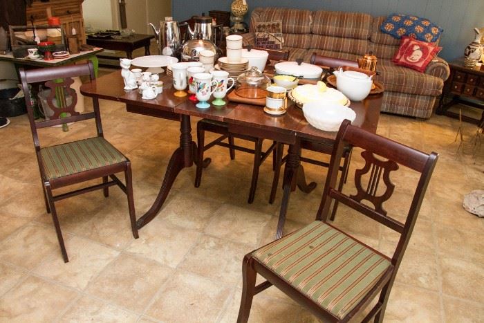 Duncan Phyfe Drop Leaf Dining Table, 1930's Mahogany Veneer with Original Brass Clawfeet  36"W x 56"L x 30"H.  4 Chairs with Lyre Back included in the Set.  $225.00