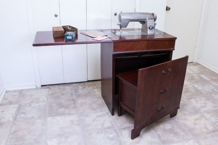 Mid Century 1940's Kenmore Electric Rotary Sewing Machine in Original Mahogany Cabinet with Storage Chair  $285.00