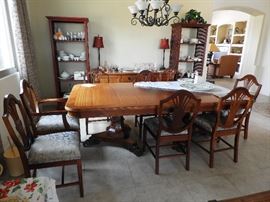 Large dining room table with 8 chairs