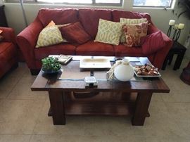Mission style coffee table, red microfiber sofa