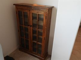 Small glass front bookcase