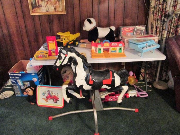 Vintage toys.  Rocking Horse, Tonka and Fisher Price