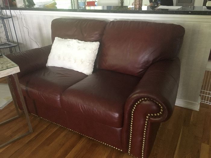 Red leather sofas & chair with ottoman 