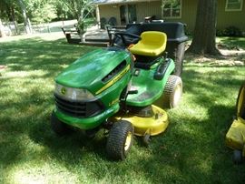 John Deere LA(145hours)42" deck with dual bagger , new blades/seat,&short turn
