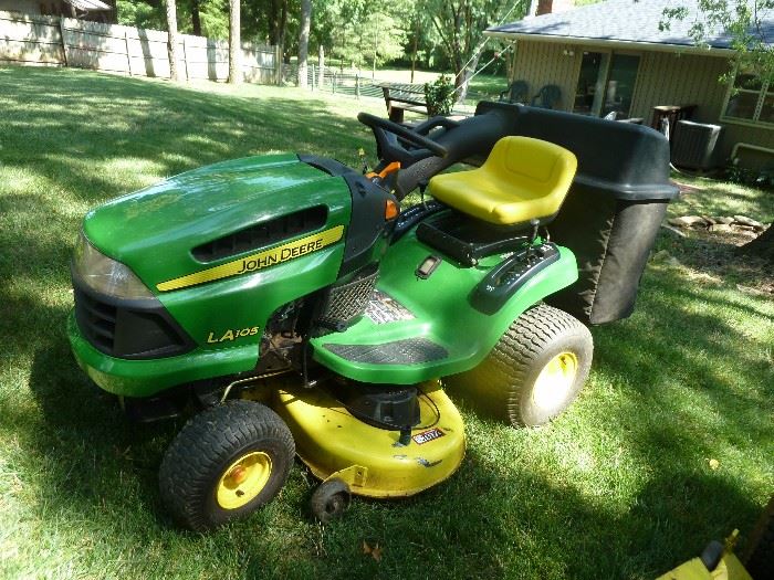 John Deere LA(145hours)42" deck with dual bagger , new blades/seat,&short turn