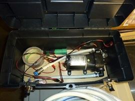 water pump for camper or trailer with large tub on wheels with spout!