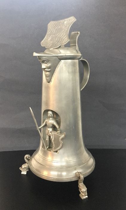 Antique pewter tankard or flagon with a knight figure