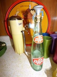 Dazey wall mounted ice crusher, vintage Dr. Pepper bottle with clothes sprinkler inserted