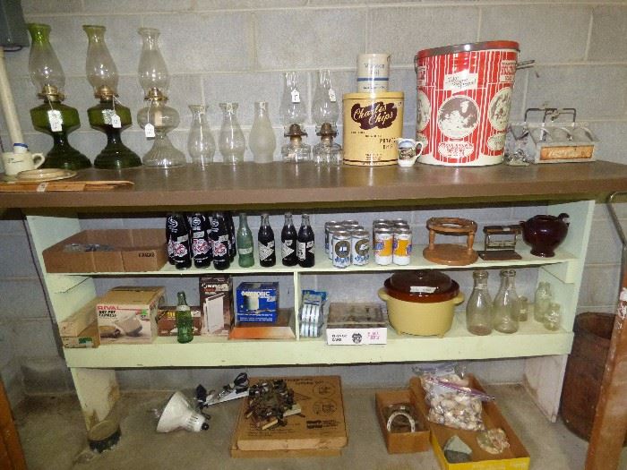Vintage Coke & other glass bottles, tins, oil lamps, Coca Cola carriers, etc