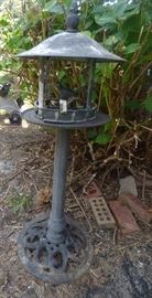 Cast iron base standing bird feeder