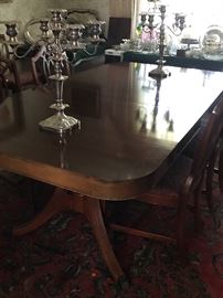 Dining room table with two leaves and six chairs