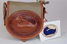 Lot 12. Dooney & Bourke R150 All-Weather Leather Small Saddle Style Bag