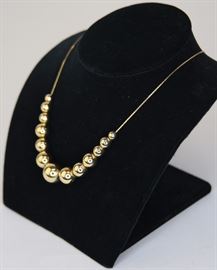 Lot 123. Gold Tone Beaded Necklace