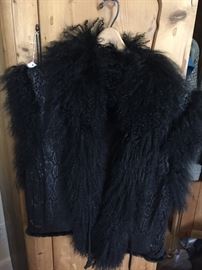 Reversable fur and stenciled leather vest.  Gorgeous!